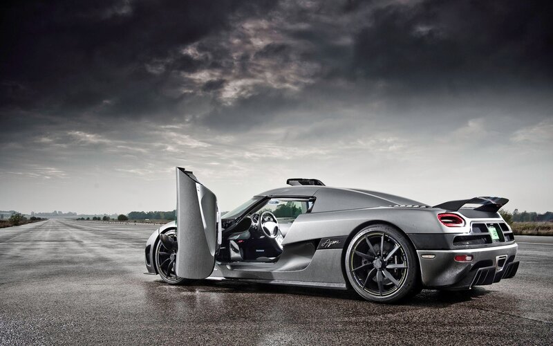 Silver Sports Car — Gray, Dramatic, Photograph, Open Door, Runway, Cloudy Sky