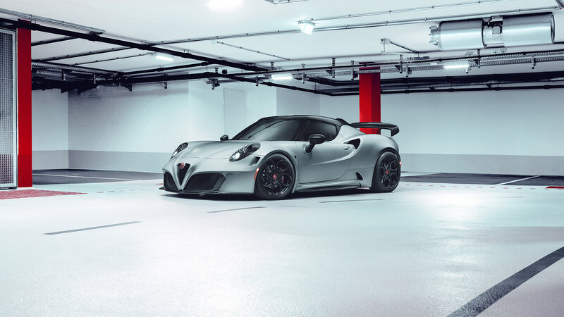 Silver Sports Car — Gray, Dramatic, Photograph, Parking Garage, Red Pillar