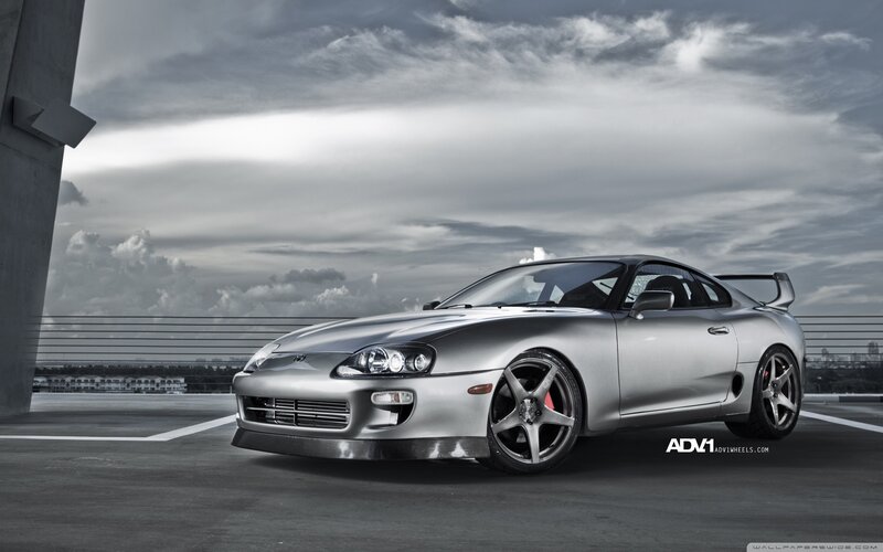 Silver Sports Car — Gray, Dramatic, Photograph, Sky, Parking Lot, Tire