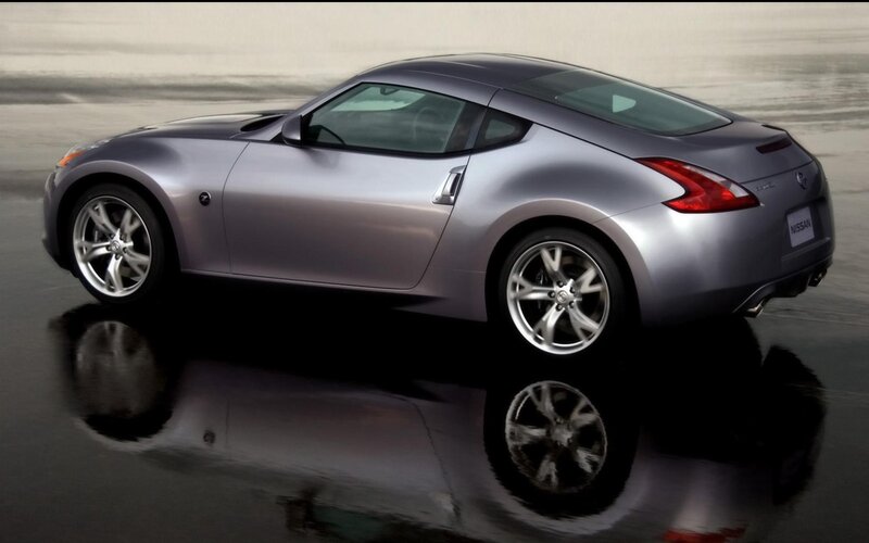 Silver Sports Car — Gray, Dramatic, Photograph, Wet Surface, Reflection, Black