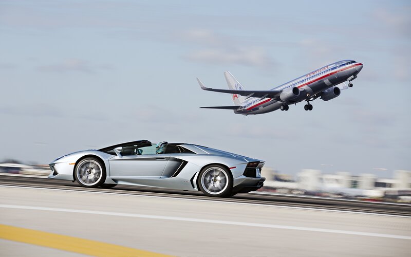 Silver Sports Car — Gray, Dynamic, Afternoon, Photograph, Airplane
