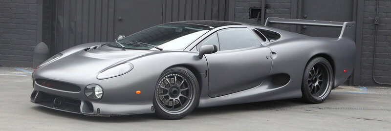 Silver Sports Car — Gray, Neutral, Photograph, Tire, Wing, Building