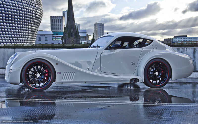 Silver sports car in city
