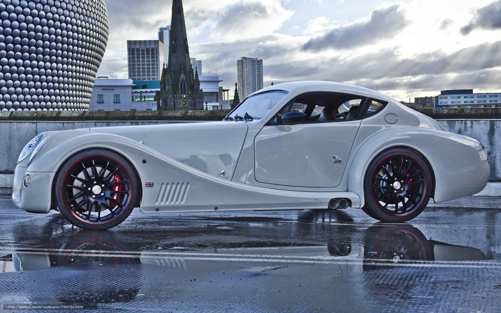 Silver sports car in city