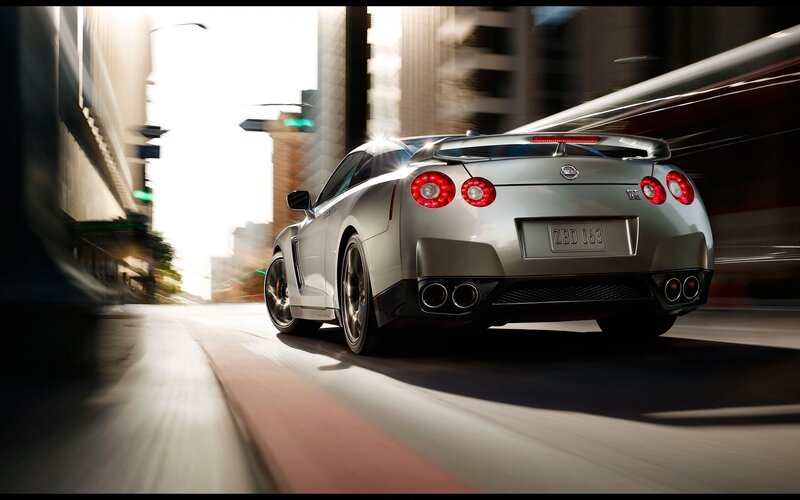 silver sports car in city