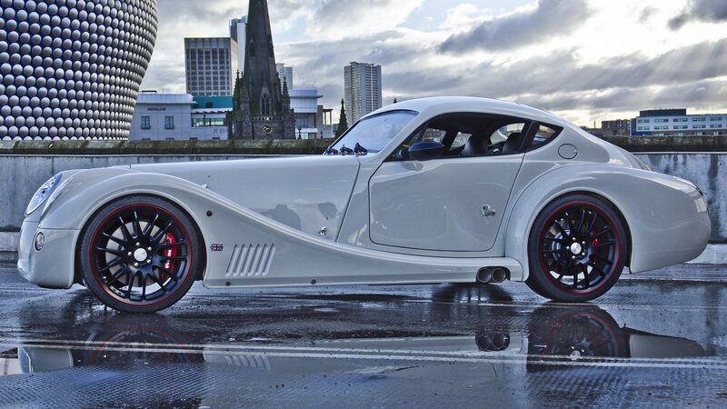 silver sports car in city