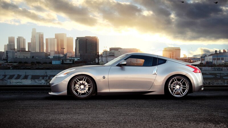Silver sports car in cityscape