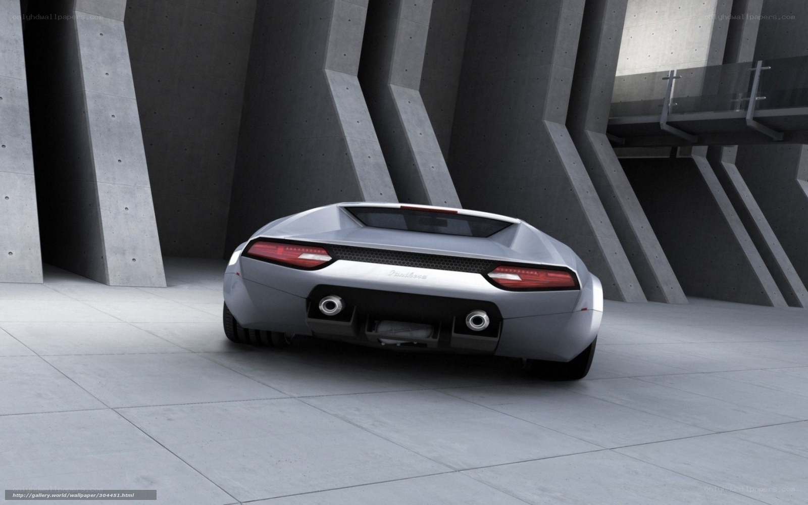 Silver sports car in concrete structure