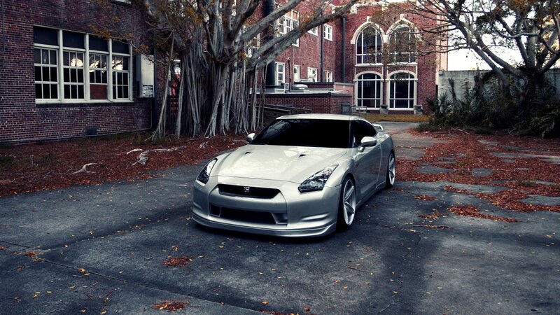 silver sports car in courtyard