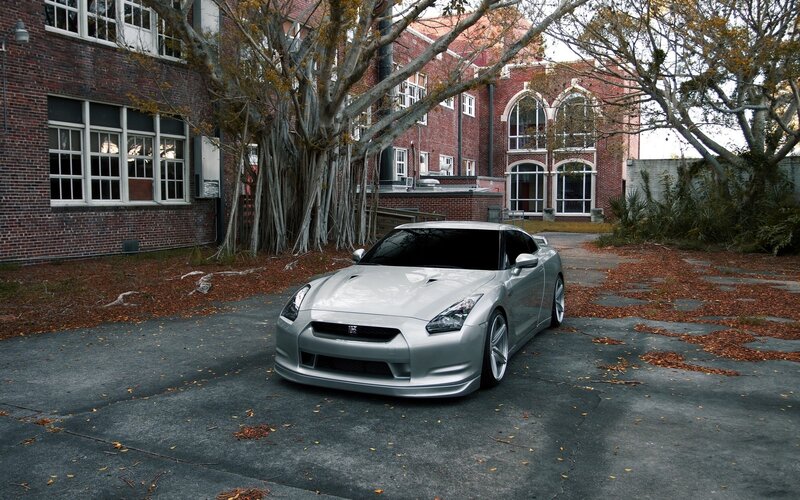 silver sports car in courtyard