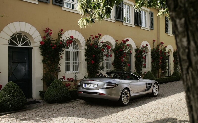 Silver sports car in courtyard