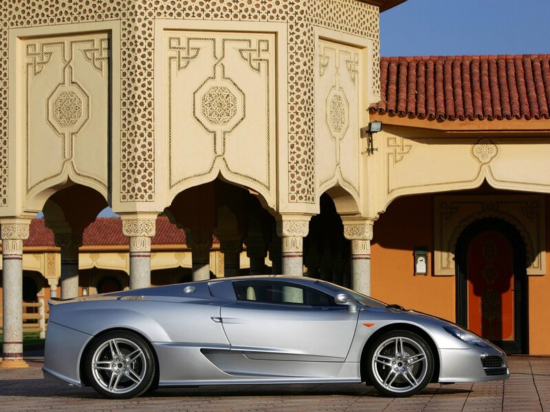 Silver sports car in courtyard