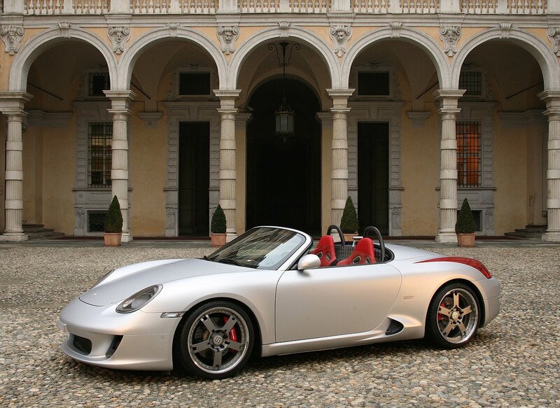 Silver sports car in courtyard