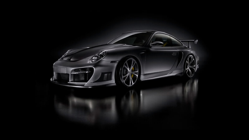 silver sports car in dark studio