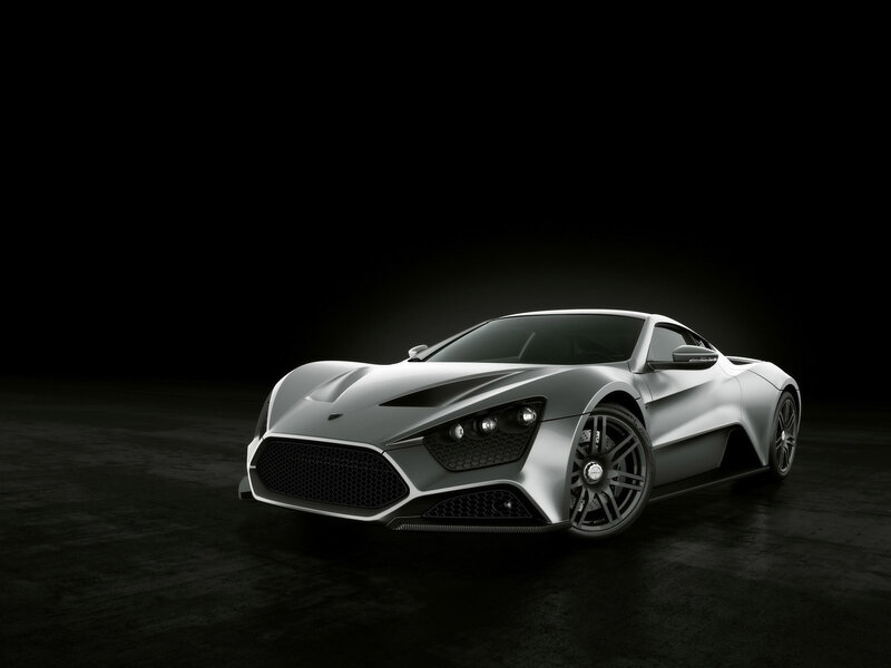 Silver sports car in dark studio