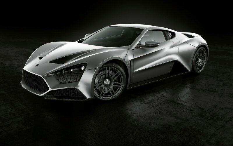 silver sports car in dark studio