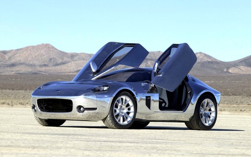 silver sports car in desert