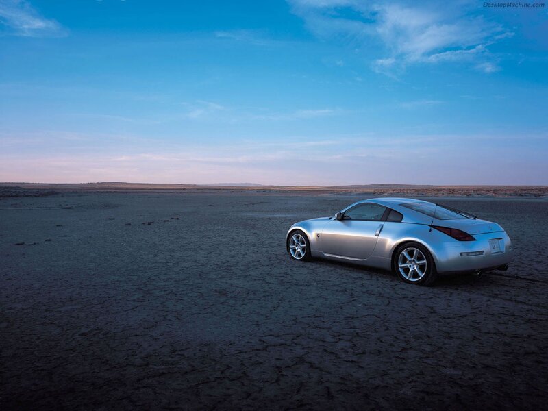 Silver sports car in desert