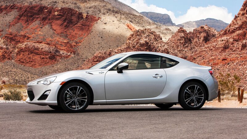 silver sports car in desert