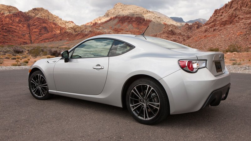 silver sports car in desert