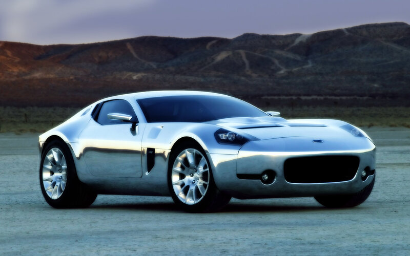 silver sports car in desert
