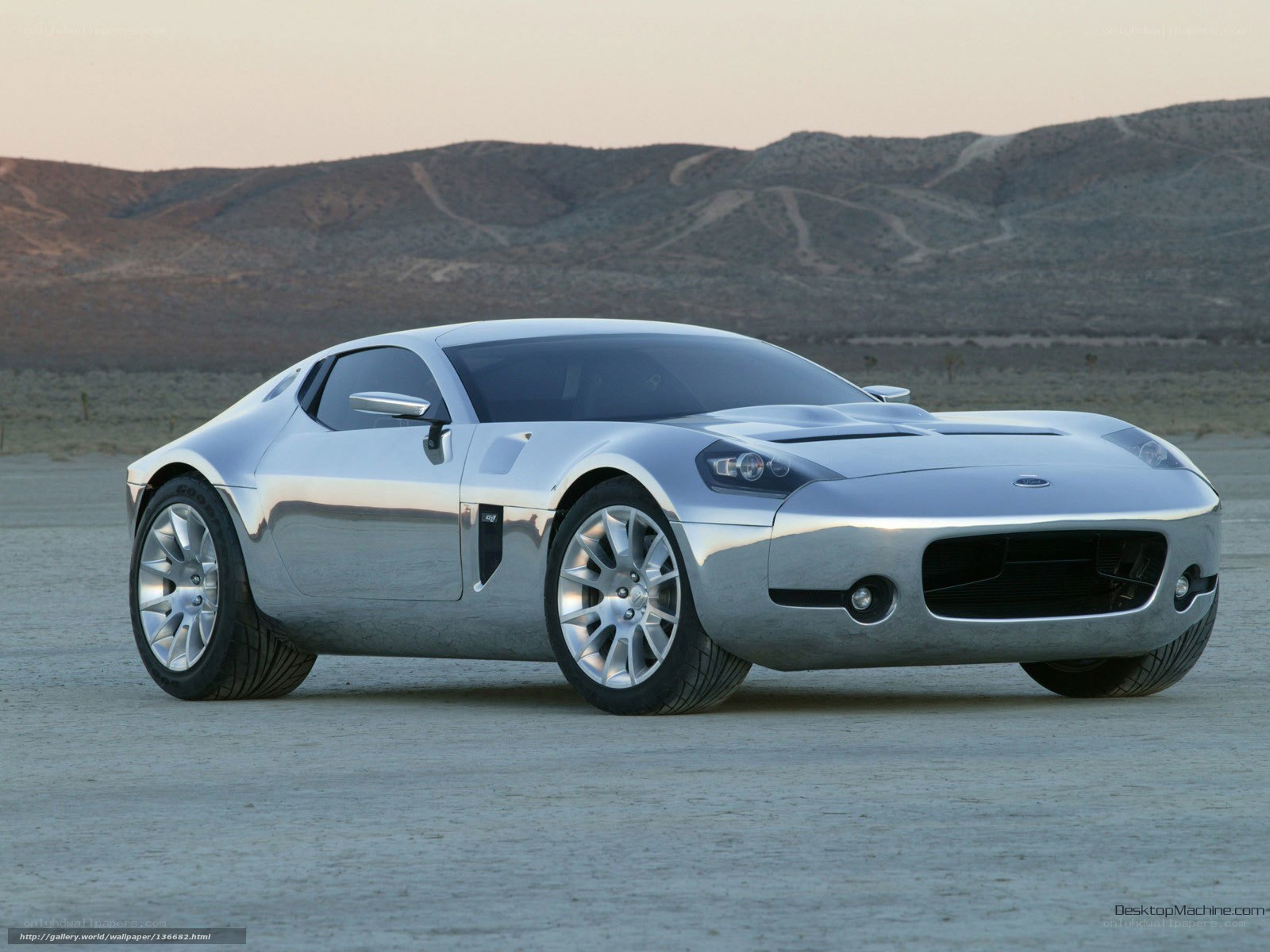 silver sports car in desert