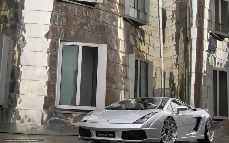 Silver sports car in front of modern building