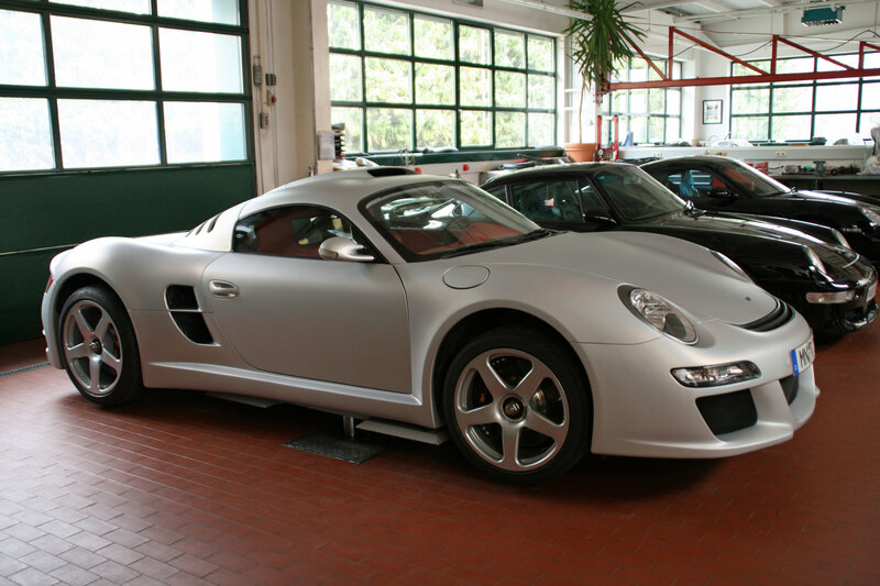 Silver sports car in garage