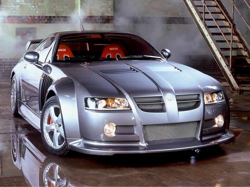 silver sports car in garage