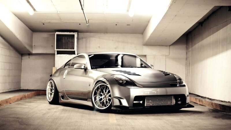 silver sports car in garage