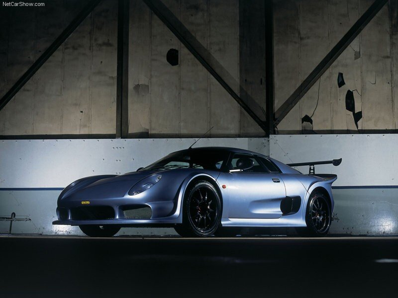 silver sports car in garage