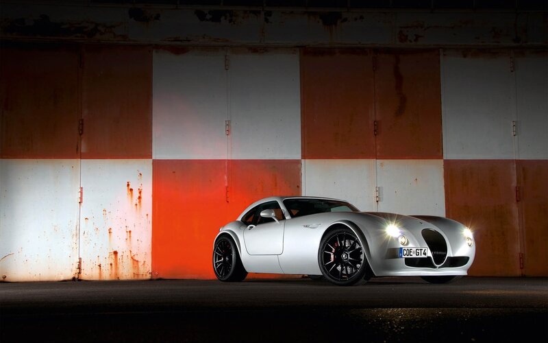Silver sports car in garage