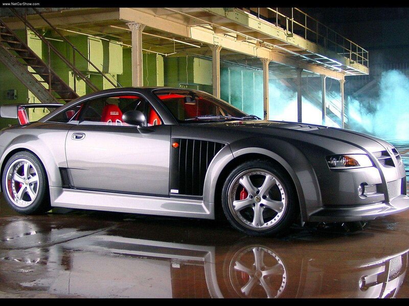 silver sports car in garage