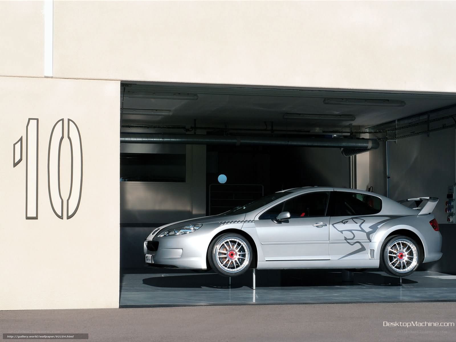 Silver sports car in garage
