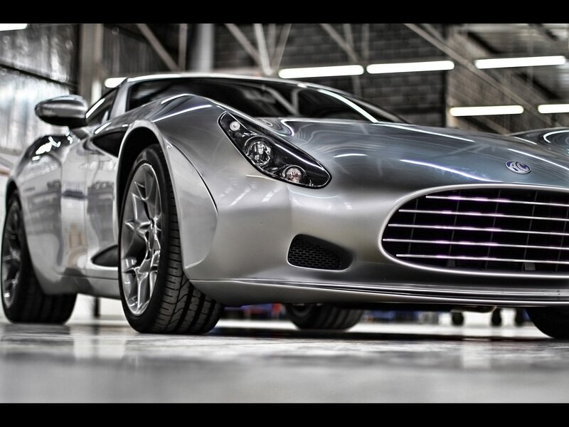 silver sports car in garage