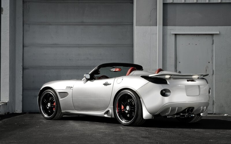 silver sports car in garage