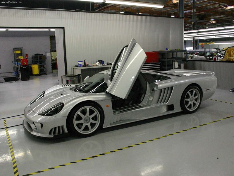 silver sports car in garage