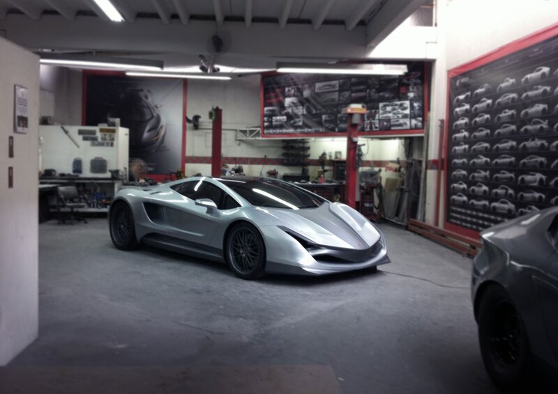Silver sports car in garage