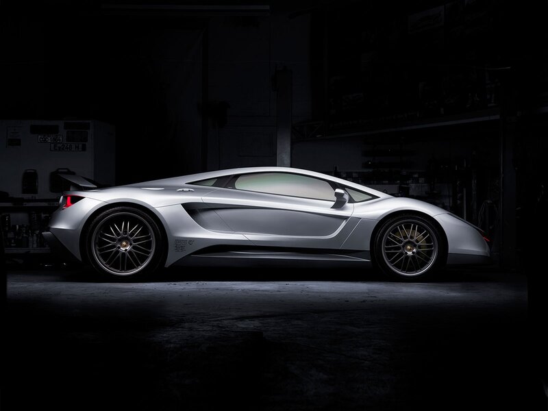 silver sports car in garage