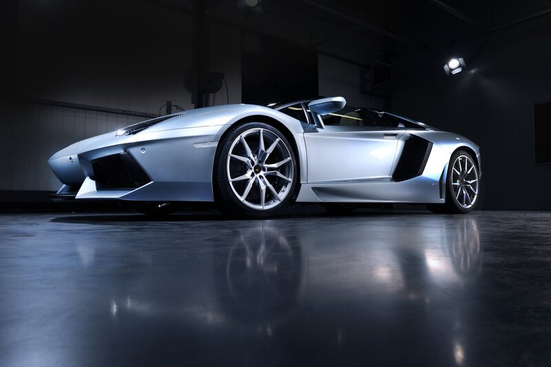 silver sports car in garage