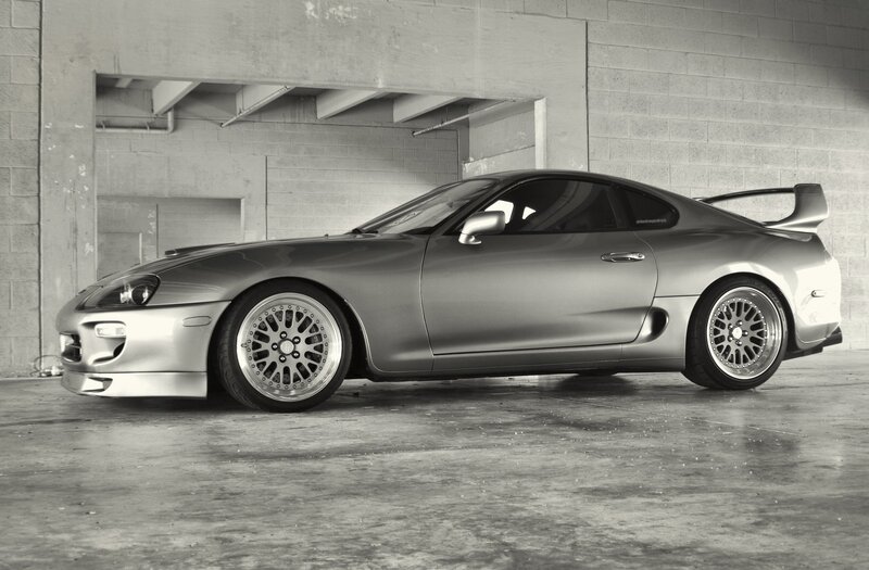 silver sports car in garage