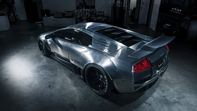 silver sports car in garage