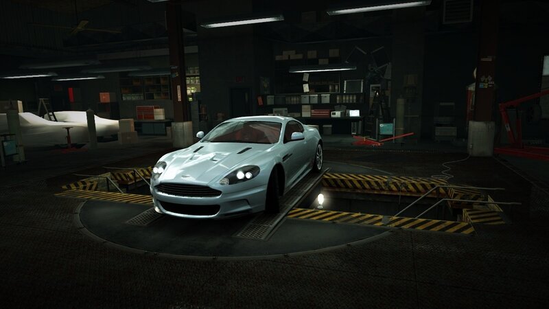 silver sports car in garage