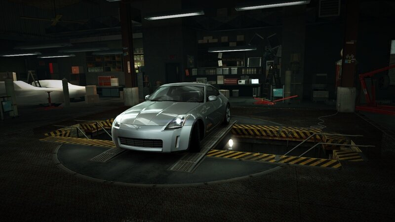 silver sports car in garage
