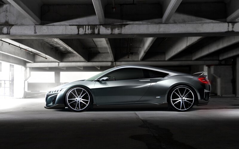 Silver sports car in garage