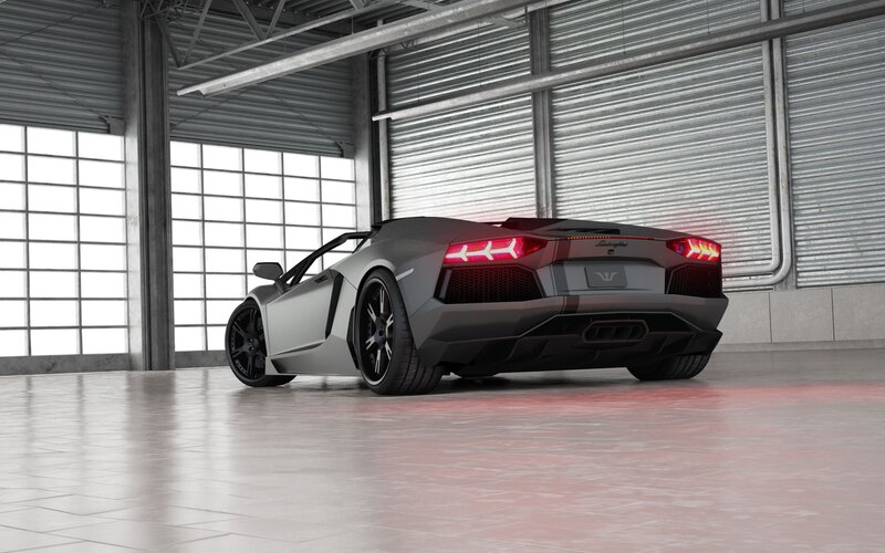 silver sports car in garage