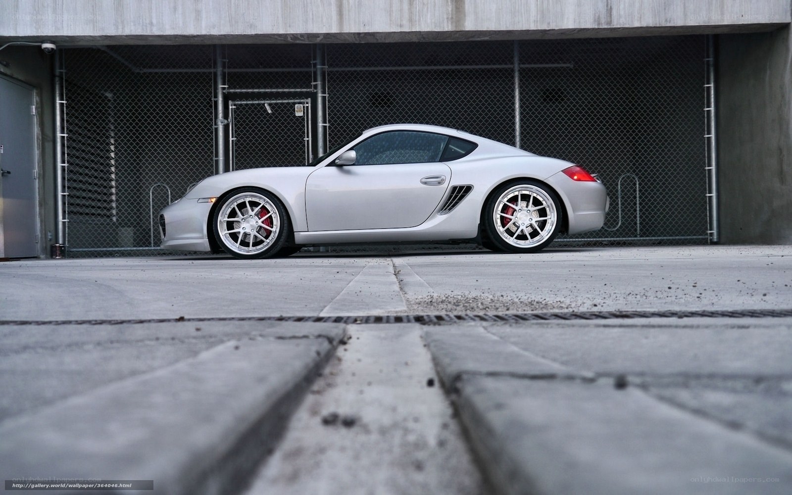silver sports car in garage
