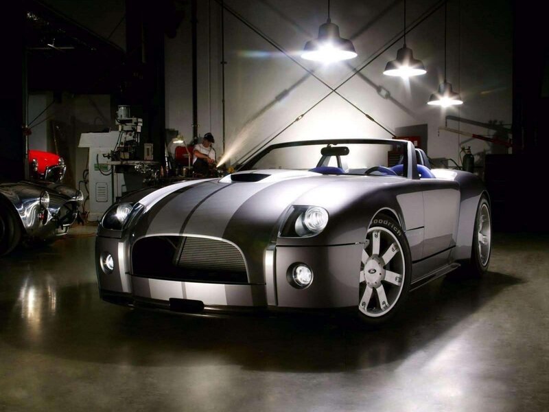 Silver sports car in garage