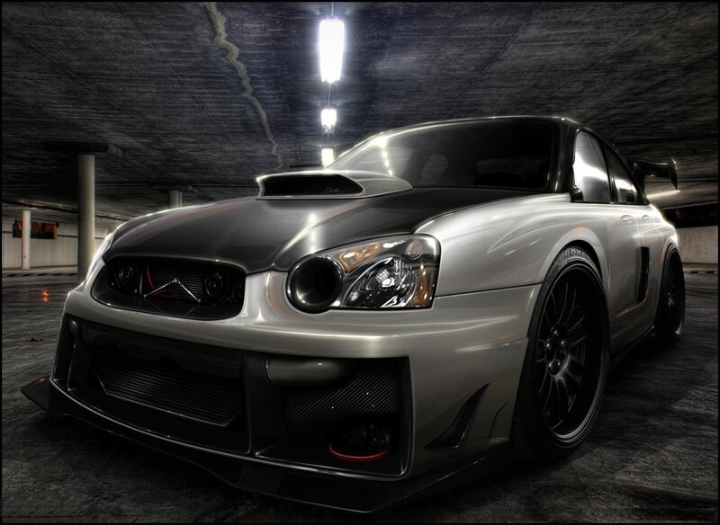 silver sports car in garage