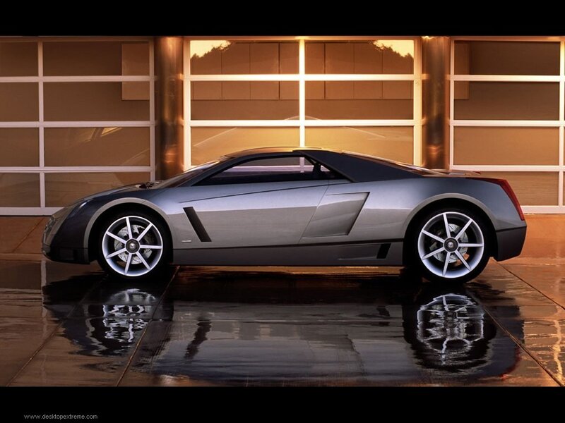 silver sports car in garage